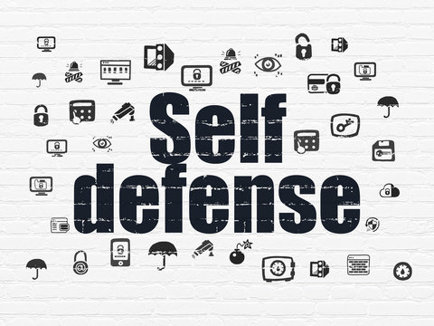Security concept: Self Defense on wall background
