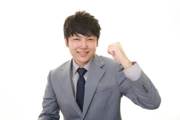ガッツポーズのビジネスマン