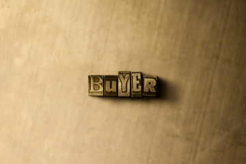 BUYER - close-up of grungy vintage typeset word on metal backdrop. Royalty free stock illustration.  Can be used for online banner ads and direct mail.