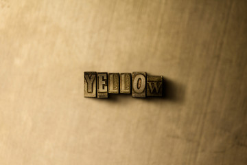 YELLOW - close-up of grungy vintage typeset word on metal backdrop. Royalty free stock illustration.  Can be used for online banner ads and direct mail.