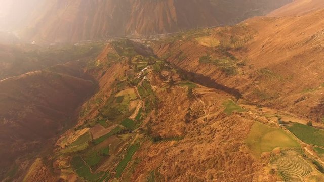 Peru Mountains Aerial v8 Flying over mountain hillsides looking down.