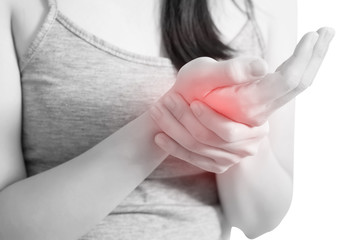 Acute pain in a woman wrist isolated on white background. Clipping path on white background.