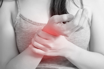 Acute pain in a woman wrist isolated on white background. Clipping path on white background.