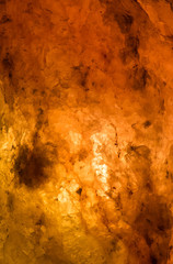 Illuminated himalayan salt lamp texture background