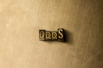 ODDS - close-up of grungy vintage typeset word on metal backdrop. Royalty free stock illustration.  Can be used for online banner ads and direct mail.