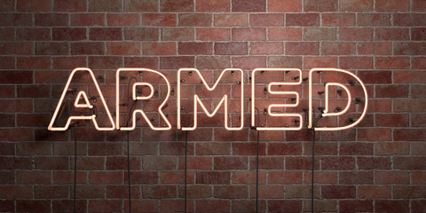 ARMED - fluorescent Neon tube Sign on brickwork - Front view - 3D rendered royalty free stock picture. Can be used for online banner ads and direct mailers..
