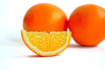 Closeup of oranges on a white background