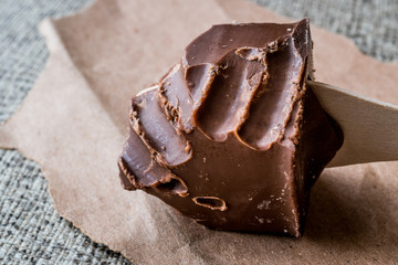 Bitten Chocolate with wooden stick