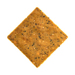 A single thin gourmet snack cracker isolated on a white background.