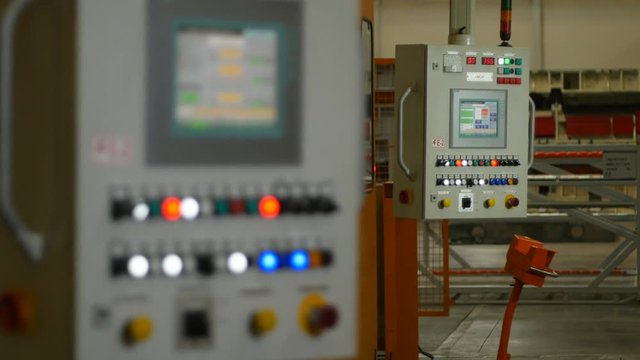 Large Control Device Panel with Buttons in Workshop