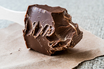 Bitten Chocolate with wooden stick