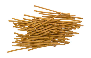 Salted whole wheat bretzel sticks isolated on a white background top view.
