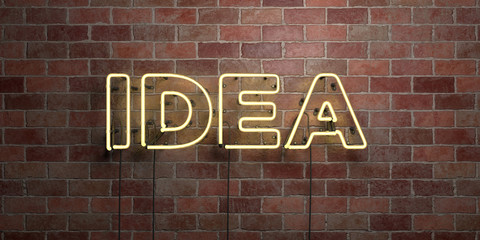 IDEA - fluorescent Neon tube Sign on brickwork - Front view - 3D rendered royalty free stock picture. Can be used for online banner ads and direct mailers..