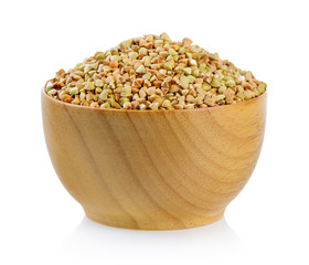 Buckwheat in wood bowl  isolated on white background