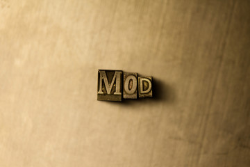 MOD - close-up of grungy vintage typeset word on metal backdrop. Royalty free stock illustration.  Can be used for online banner ads and direct mail.
