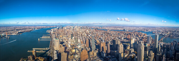 Panoramic aerial view of skyline of entire Manhattan with Hudson and East River