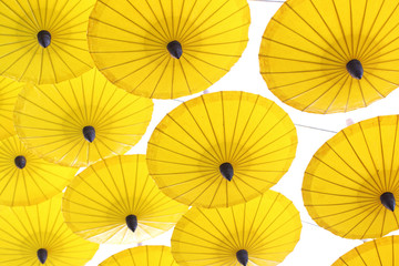 Fototapeta na wymiar Yellow Umbrella pattern on white background
