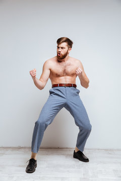 Vertical image of Male nerd as fighter