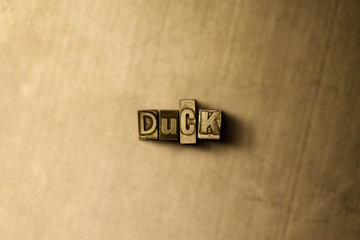 DUCK - close-up of grungy vintage typeset word on metal backdrop. Royalty free stock illustration.  Can be used for online banner ads and direct mail.