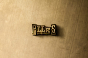 PEERS - close-up of grungy vintage typeset word on metal backdrop. Royalty free stock illustration.  Can be used for online banner ads and direct mail.