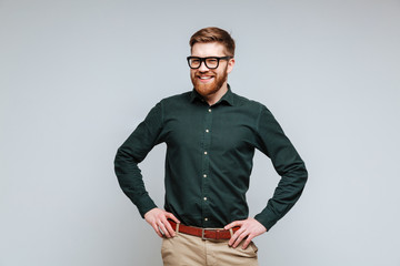 Smiling Bearded man in shirt and eyeglasses