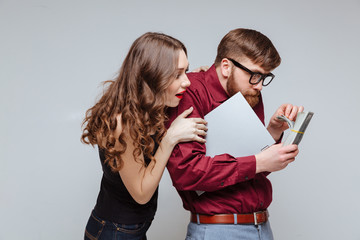 Young Woman from back of Male nerd