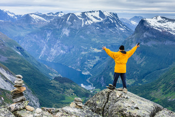 Tourist man on Dalsnibba viewpoint Norway