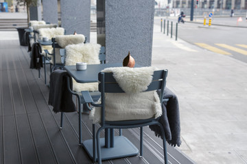 table and chairs in the street. terrace cafeteria or restaurant. street Geneva