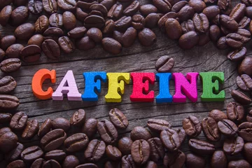 Foto op Plexiglas word caffeine and coffee beans © adragan