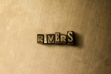 RIVERS - close-up of grungy vintage typeset word on metal backdrop. Royalty free stock illustration.  Can be used for online banner ads and direct mail.