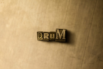 DRUM - close-up of grungy vintage typeset word on metal backdrop. Royalty free stock illustration.  Can be used for online banner ads and direct mail.