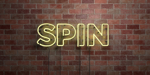 SPIN - fluorescent Neon tube Sign on brickwork - Front view - 3D rendered royalty free stock picture. Can be used for online banner ads and direct mailers..