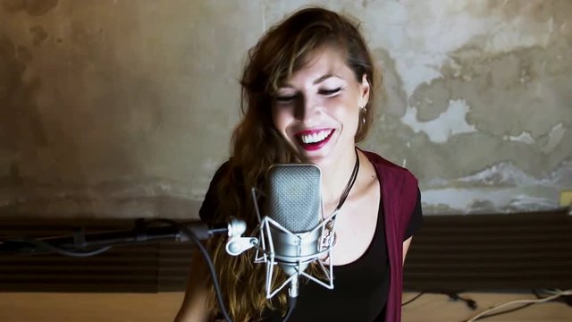 Beautiful woman portrait singing happy