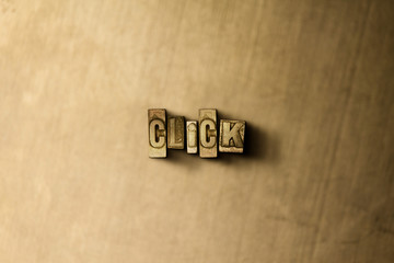 CLICK - close-up of grungy vintage typeset word on metal backdrop. Royalty free stock illustration.  Can be used for online banner ads and direct mail.