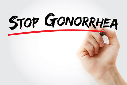 Hand writing Stop Gonorrhea with marker, health concept background