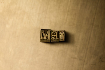 MAY - close-up of grungy vintage typeset word on metal backdrop. Royalty free stock illustration.  Can be used for online banner ads and direct mail.