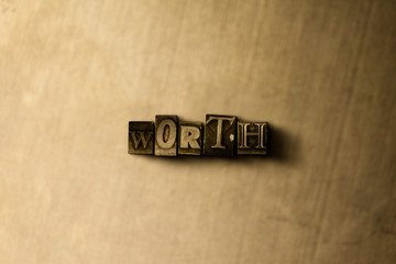 WORTH - close-up of grungy vintage typeset word on metal backdrop. Royalty free stock illustration.  Can be used for online banner ads and direct mail.