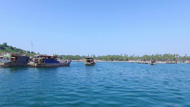 Gyeiktaw village. Ride with boat along fishing village and fishermen's boats at Ngapali Beach in Myanmar.