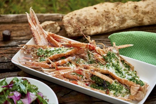 Lobster with parsley sauce and bread