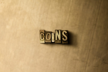 COINS - close-up of grungy vintage typeset word on metal backdrop. Royalty free stock illustration.  Can be used for online banner ads and direct mail.