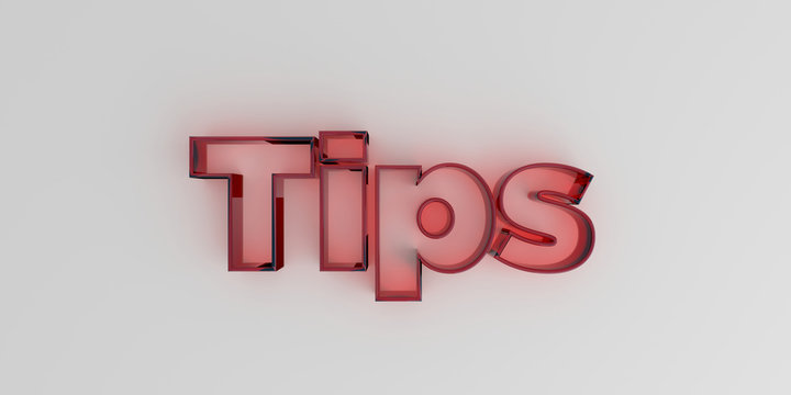 Tips - Red glass text on white background - 3D rendered royalty free stock image.