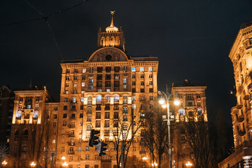 Fototapeta na wymiar illuminated facade of a large old building