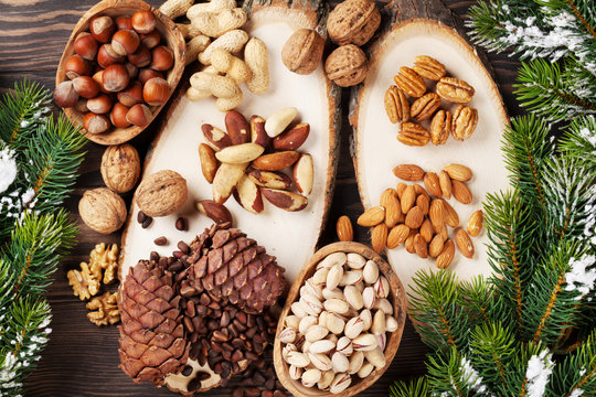 Various nuts on wooden table