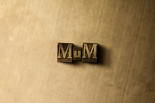 MUM - close-up of grungy vintage typeset word on metal backdrop. Royalty free stock illustration.  Can be used for online banner ads and direct mail.