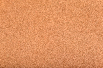 Closeup image of cow brown leather skin texture.
