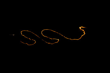 Abstract flame on the dark background.