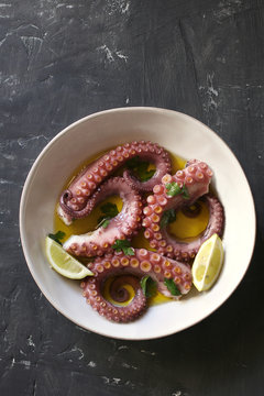 Portuguese cooked octopus with olive oil,garlic and parsley