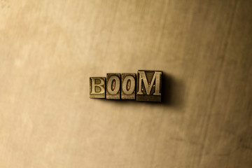 BOOM - close-up of grungy vintage typeset word on metal backdrop. Royalty free stock illustration.  Can be used for online banner ads and direct mail.