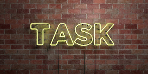 TASK - fluorescent Neon tube Sign on brickwork - Front view - 3D rendered royalty free stock picture. Can be used for online banner ads and direct mailers..