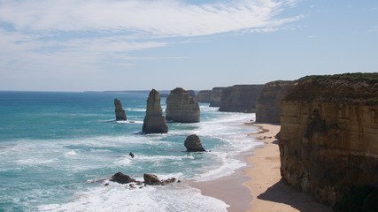 The Twelve Apostles is a collection of limestone stacks off the shore of the Port Campbell National Park, by the Great Ocean Road in Victoria, Australia.